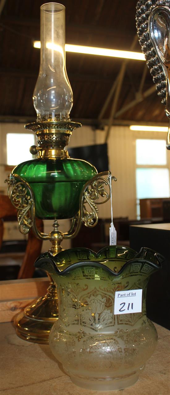 Dark green glass oil lamp